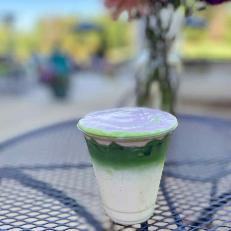 Refreshing drink on patio with blurred background