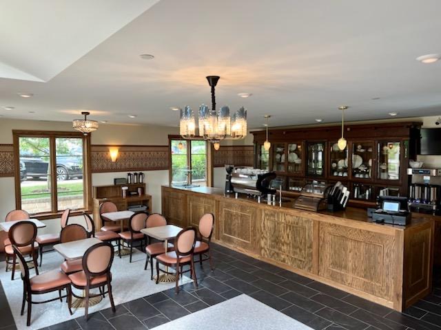 Modern cafe with large windows and lights